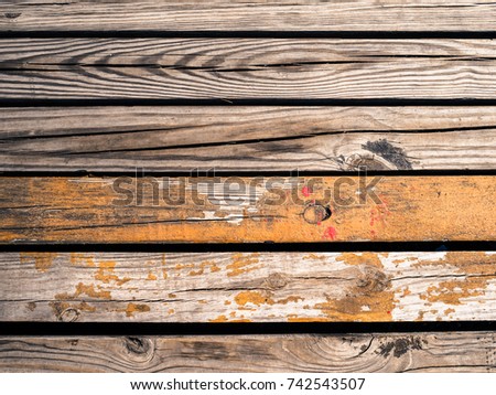 Old wooden planks gritty wood texture  autumn fall rustic background orange and red paint splatters flecks with copy space series