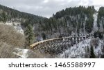 Old wooden railway track in the snowy forest of CloudCroft, New Mexico