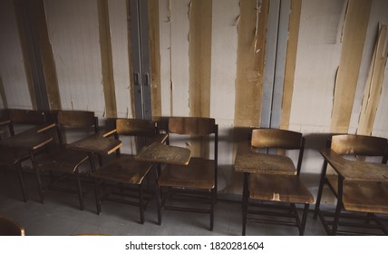 Old Wooden Row Lecture Chairs In Dirty Classroom In Poor School.study Room Without Student.concept For Education In Third World ,donate And Charity