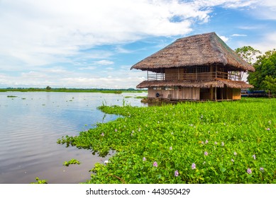 Old Wooden Shack Floating On The Amazon River In Iquitos, Peru