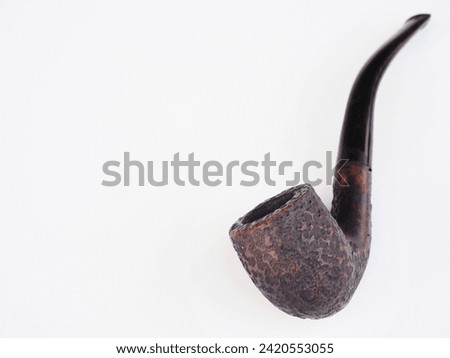 old wooden smoking pipe isolated on white 