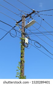 Old Wooden Street Light Pole With Internet Router