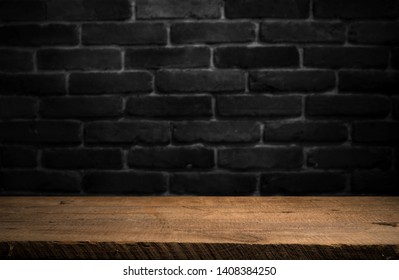 Old Wooden Table With Brick Background Dark