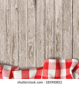 Old Wooden Table With Red Picnic Tablecloth Background