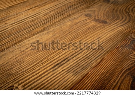 Old Wooden Texture Background Closeup. Dark Brown Wood Grain Diagonal Pattern, Vintage Pine Table Top, Dark Rustic Table Desk