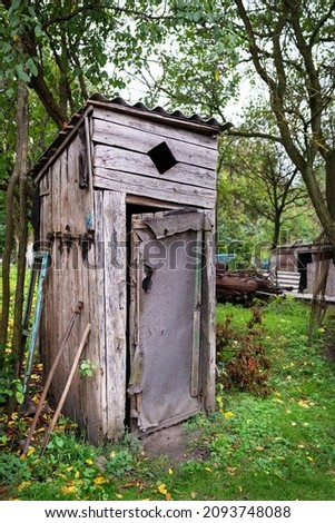 Old wooden toilet in the garden outdoors outdoors [[stock_photo]] © 