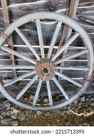 An old wooden wagon wheel