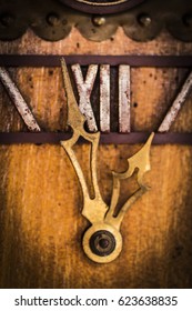 Old Wooden Wall Clock With A Cuckoo Close Up.