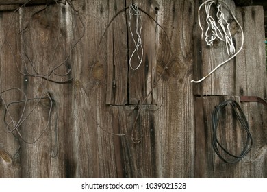 Old wooden wall with rusty objects. Countryside style