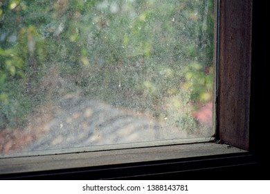 Old Wooden Window With Dusty Window Glass 