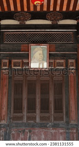 The old wooden windows view with the beautiful carved sculpture in China