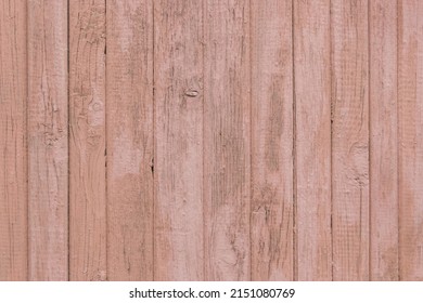 Old wooden worn fence boards weathered texture brown dirty obsolete plank background.