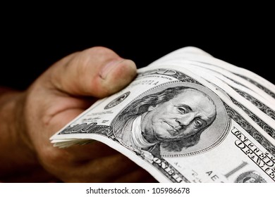 Old Working Man Hand Holding American Money