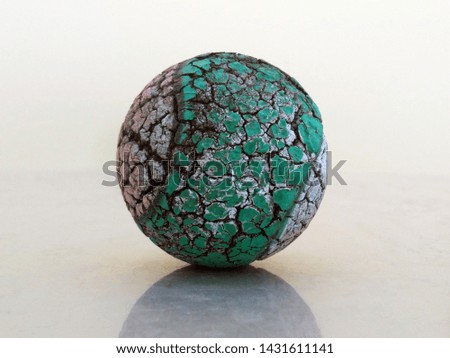 old worn ball isolated on a white background.