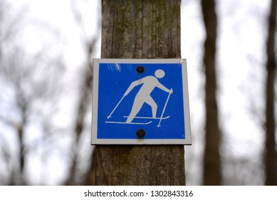 Old Worn Blue Icon Ski Trail Sign With Copy Space.