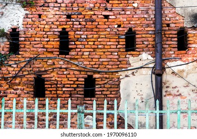 Old Worn Out Brick Wall With Ventilators Of An Old Building Of North Kolkata