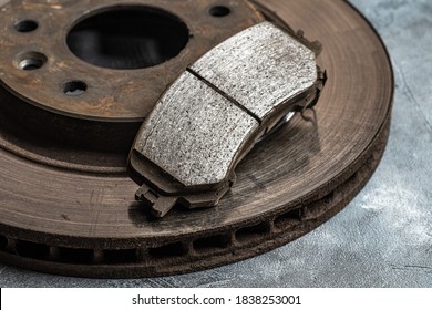 Old Worn Out Car Brake Disc And Brake Pads, Macro Shot Close-up