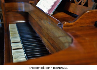 Old Worn Out Piano Close Up Of Missing Keys