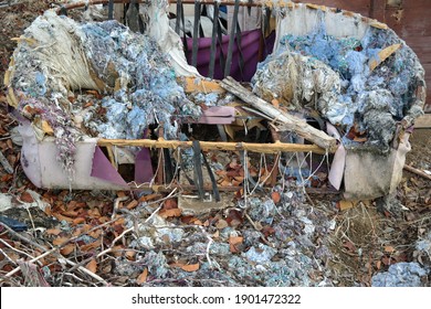 Old And Worn Sofa In The Garden