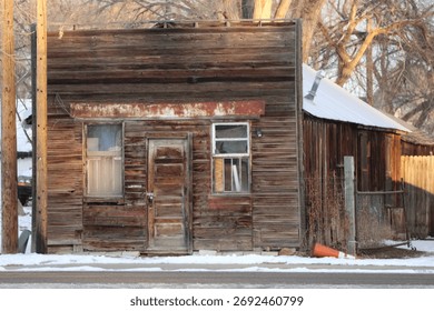 Old and worn storefront in winter