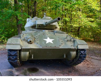 Old WWII Tank With US Military Star On The Front As A Memorial