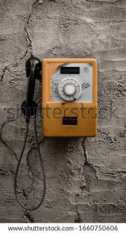 Similar – yellow retro telephone on pink wall, china