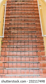 Old Yellow Plaster Building With Red Quarry Tile Steps