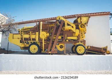 Old Yellow Threshing Machine. Side View