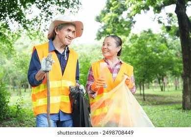 older adult husband and wife in safety vest walking in the garden collecting and sorting waste,asian senior couple spend holiday time doing volunteer activity collecting and sorting waste in the park - Powered by Shutterstock