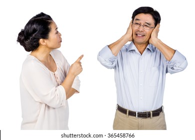 Older asian couple having an argument on white background - Powered by Shutterstock