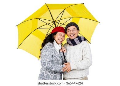 Older Asian Couple Under Umbrella On White Background