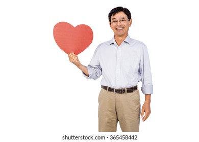 Older Asian Man Showing Heart On White Background