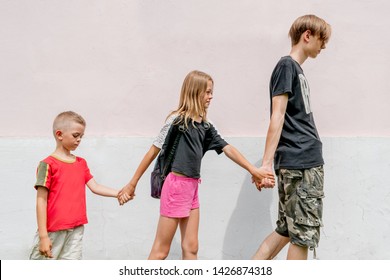 Older Brother With Sister And Brother