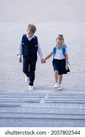 The Older Brother Takes His Younger Sister To School