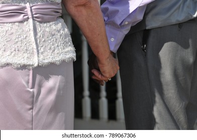 Older Couple Getting Married Holding Hands