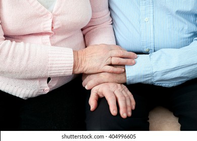 Older Couple Holding Hands