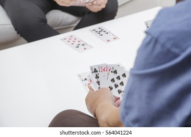 Older Couple Playing Card Game