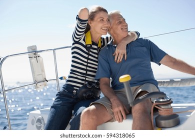 Older Couple Sitting On Boat