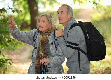 Older Couple In Woods