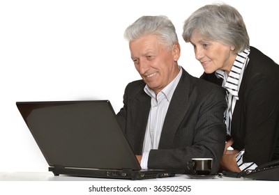 Older Couple In The Workplace