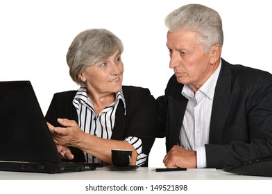 Older Couple In The Workplace On A White Background