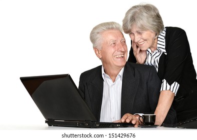 Older Couple In The Workplace On A White Background