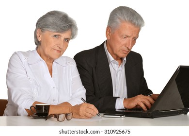 Older Couple In The Workplace On A White Background