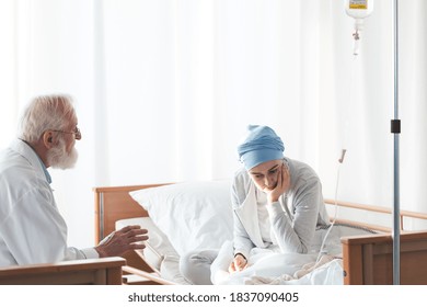 Older Doctor Sharing Bad News With His Sick Worried Patient