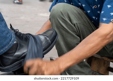 older latino man, dark skinned, cleaning and shining shoes, happy with his profession mexico guadalajara, latin america - Powered by Shutterstock