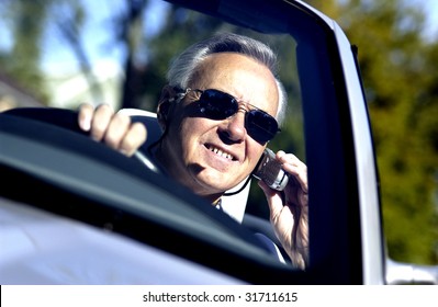 Older Man In Convertible