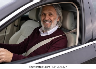 Older Man Enjoys Driving His Car