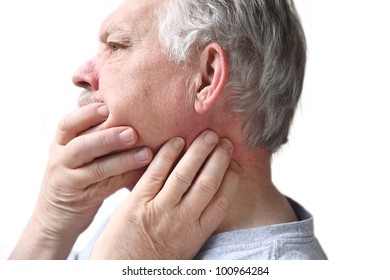 Older Man Has Difficulty Moving His Neck Or Jaw