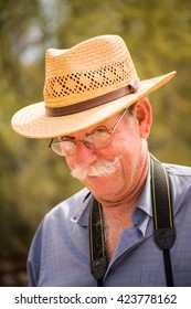 Older Man With Hat, Making A Goofy Face