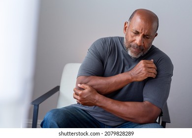 Older man having joint pain.